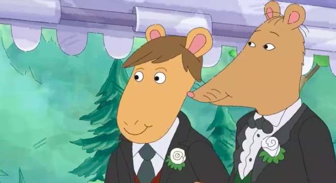 Mr. Ratburn walks down the aisle with his fiance.
