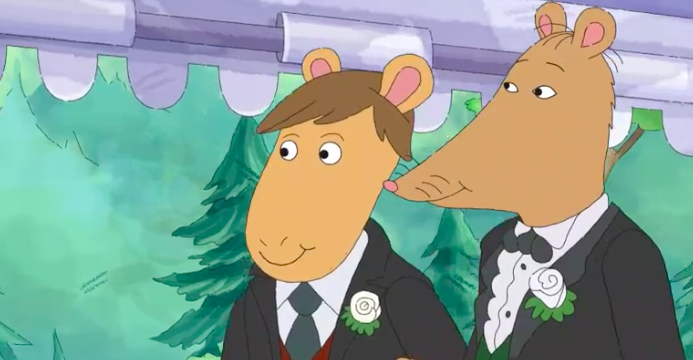 Mr. Ratburn walks down the aisle with his fiance.
