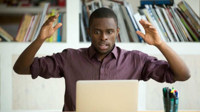 confused guy on computer