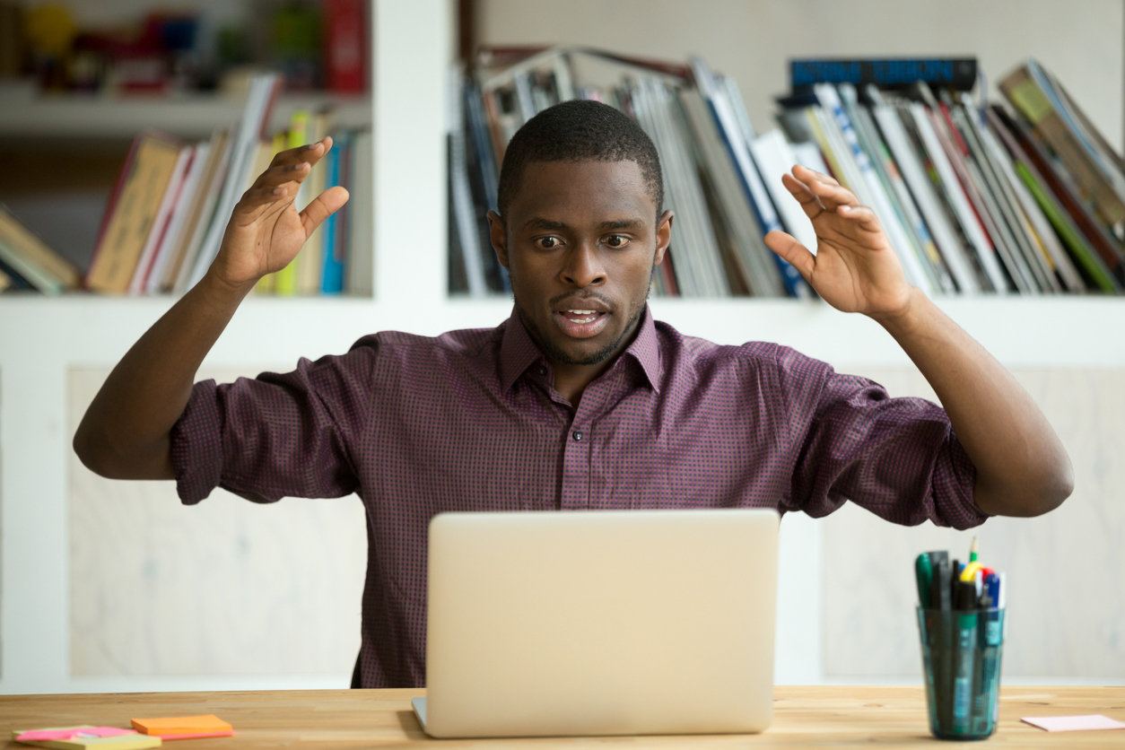 confused guy on computer