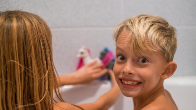siblings taking a bath together