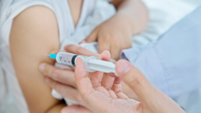 Minor getting vaccinated