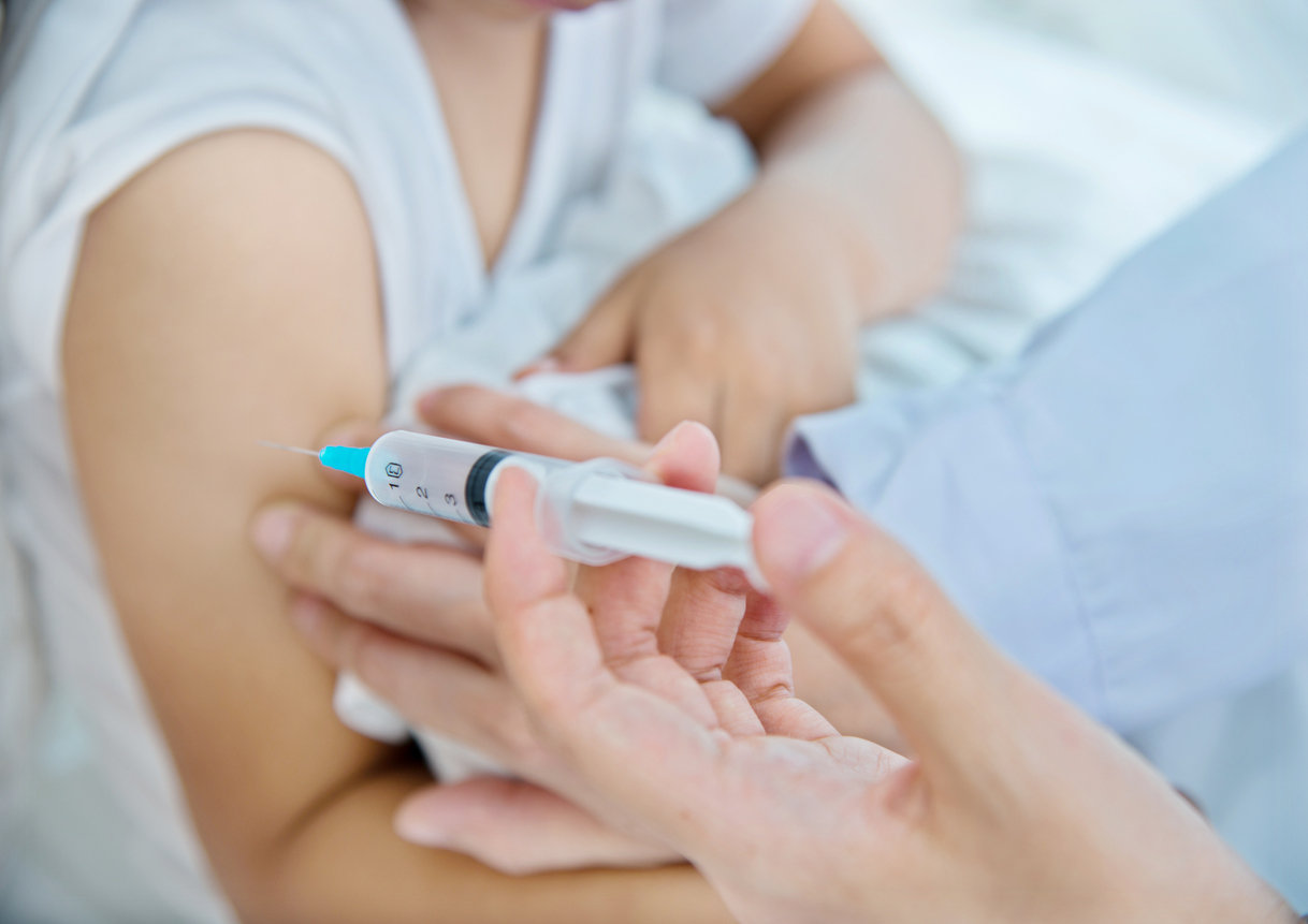 Minor getting vaccinated