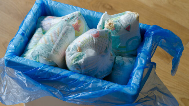 diapers in a trashcan