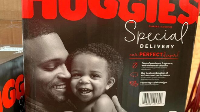Photo by Joe Flowers Jr. of a Huggies diaper box with a black dad and his daughter
