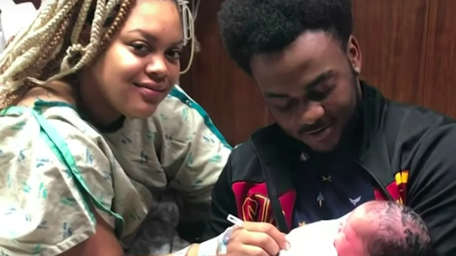 The Langfords hold their baby girl