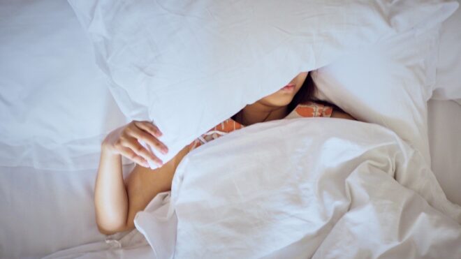 woman with pillow