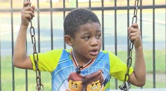 Jayden Espinosa on the swing set