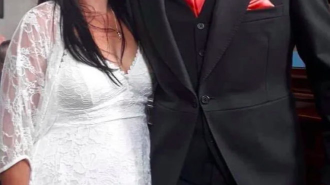 mother of groom wears wedding dress