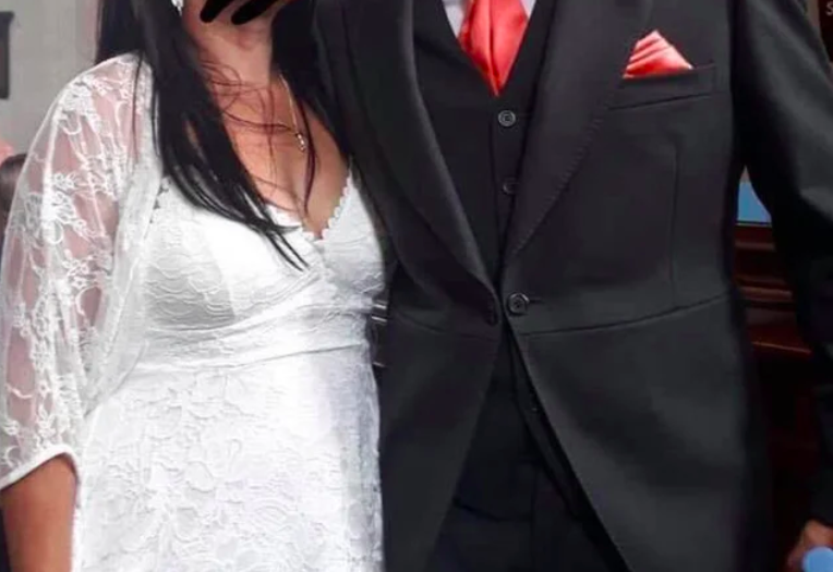 mother of groom wears wedding dress