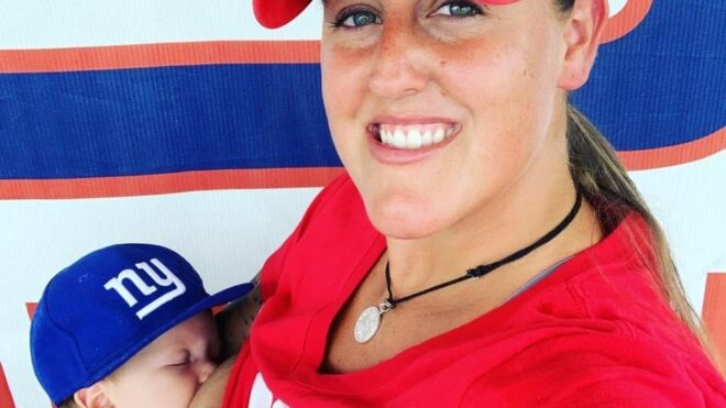 Sarah Zadoyko-Bartee with her baby at the Giants game
