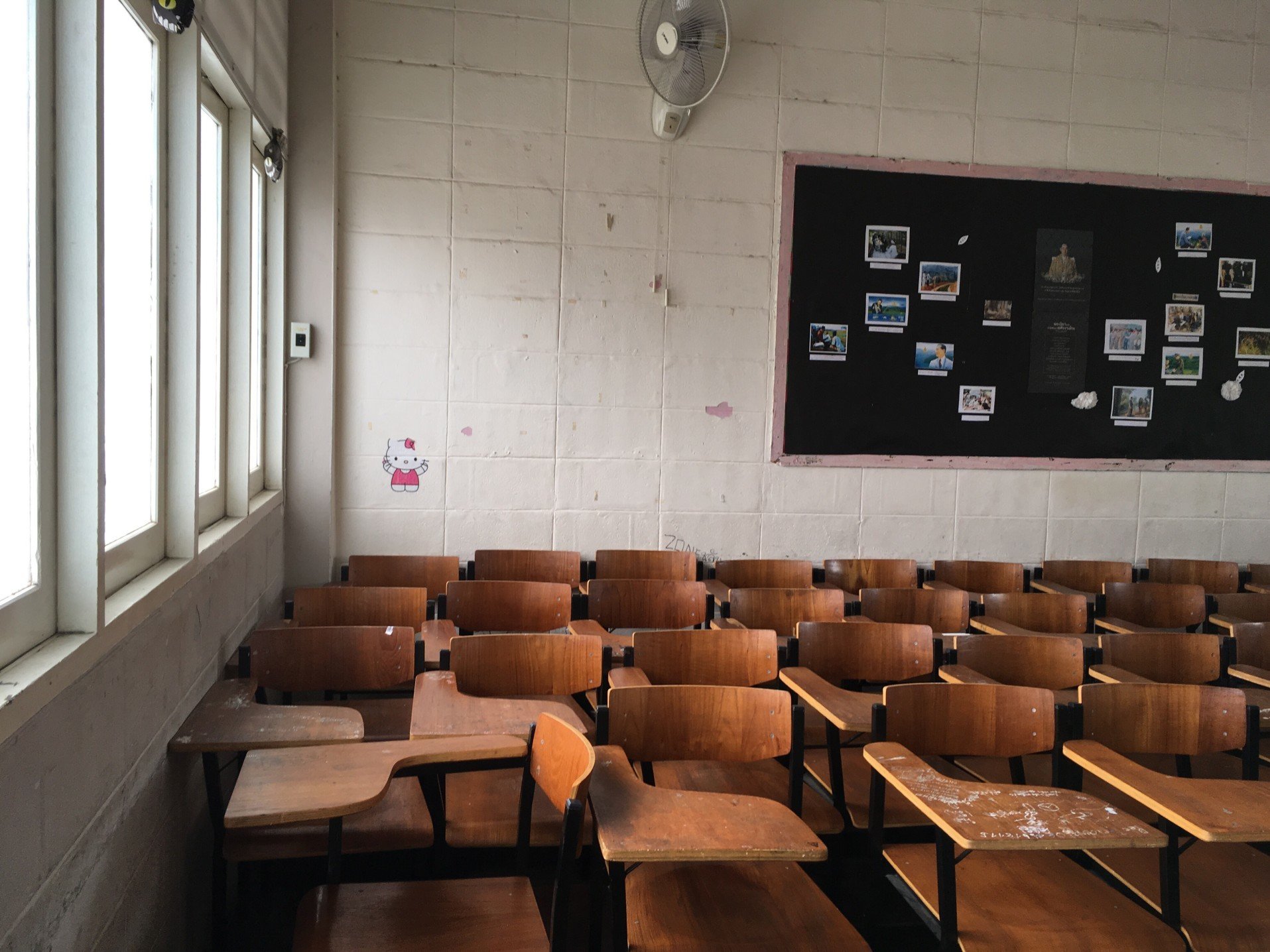 Empty classroom full of desks