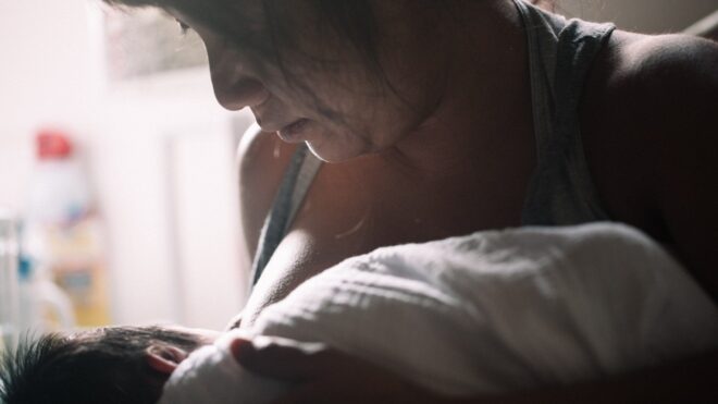 Mom breastfeeding baby