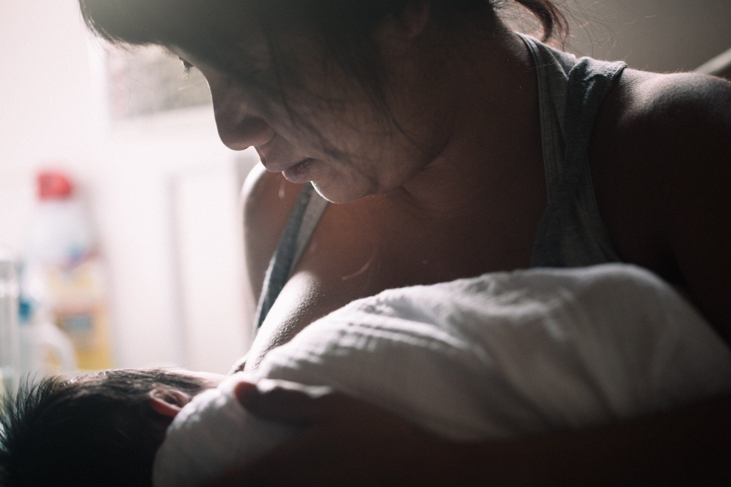 Mom breastfeeding baby