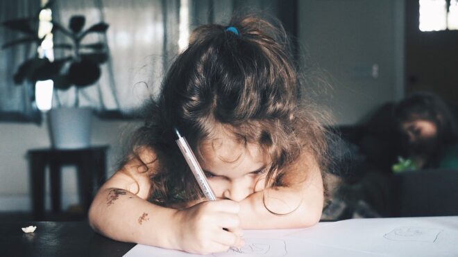 Kid signs a sleepover contract