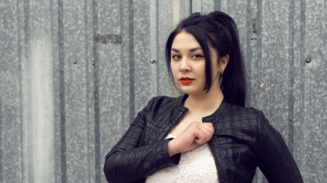 latina wearing fall jacket