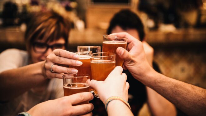 Friends cheersing drinks