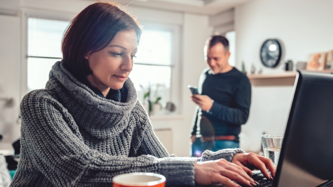 man and woman working at home
