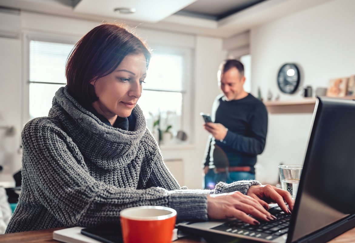 man and woman working at home