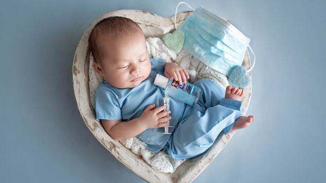 baby in nurse outfit