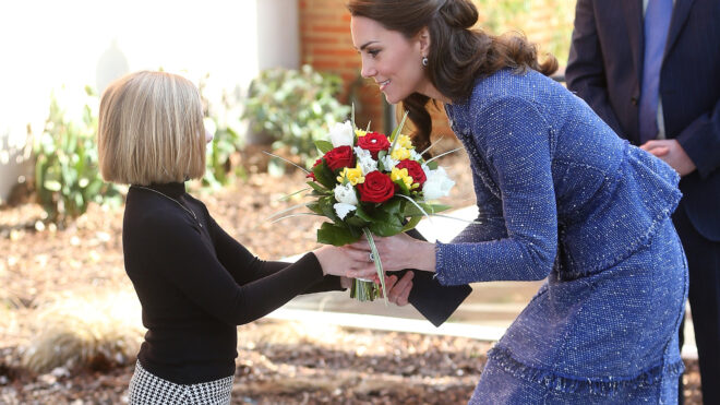 kate middleton in blue suit with little girl