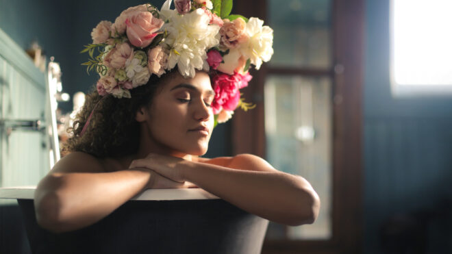 Beautiful woman enjoying a bath stock photo