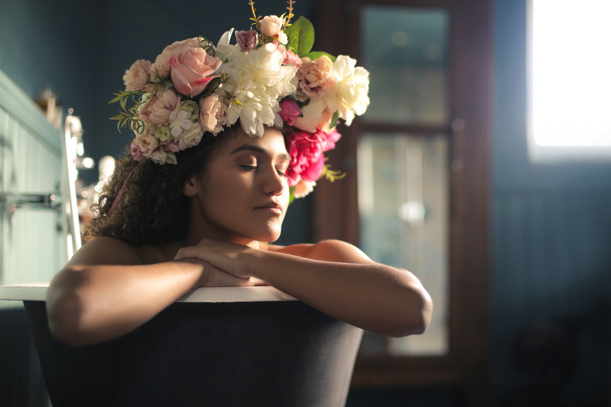 Beautiful woman enjoying a bath stock photo