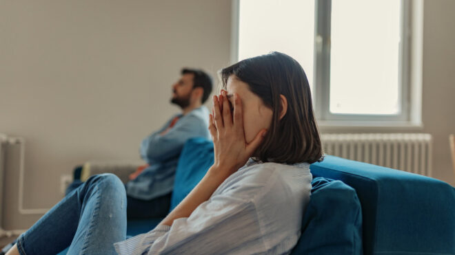 Wife cowers in fear of husband
