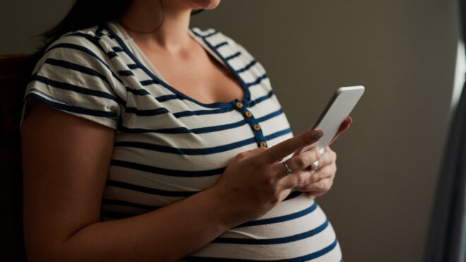 pregnant woman on phone