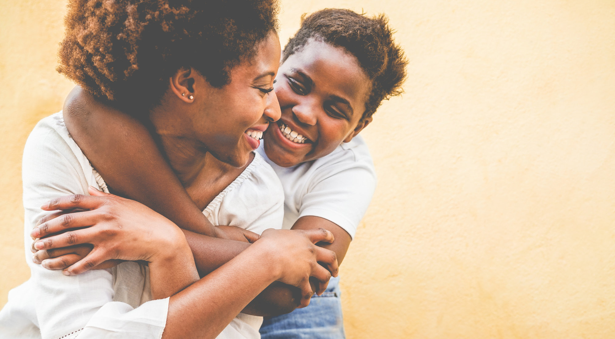 mother and child hugging