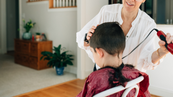mom shaving kid's head