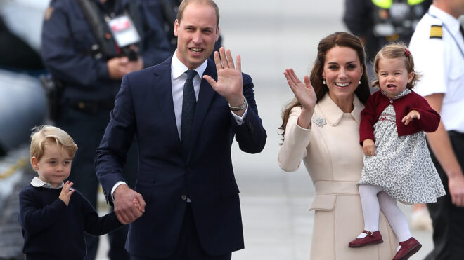 Prince William and Kate Middleton caring for two of their three children.