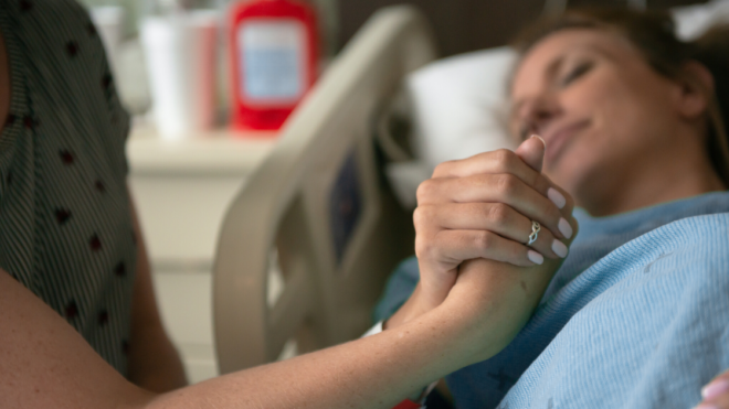 woman in labor man helping