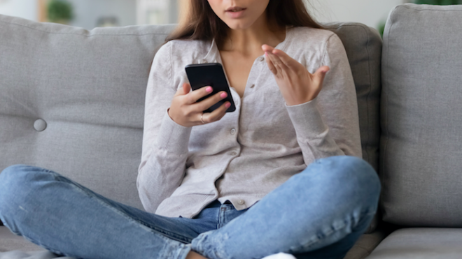 Woman upset texting