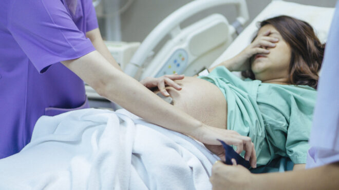 Pregnant woman in delivery room