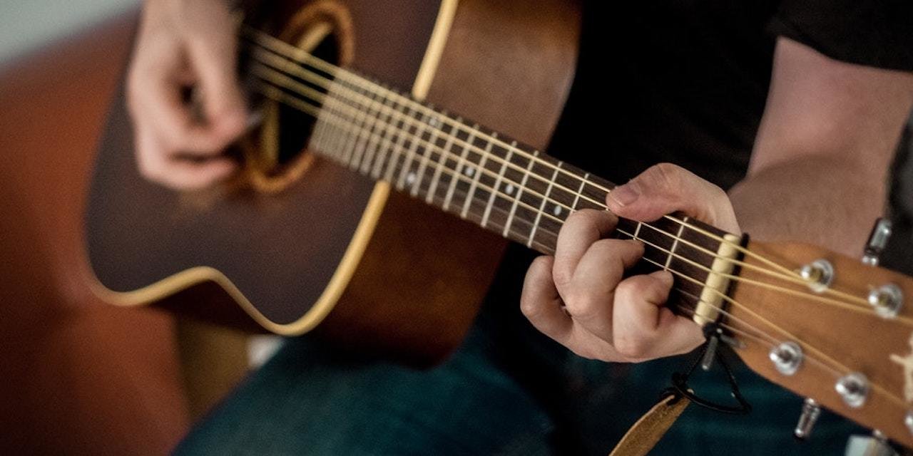 man-playing-guitar