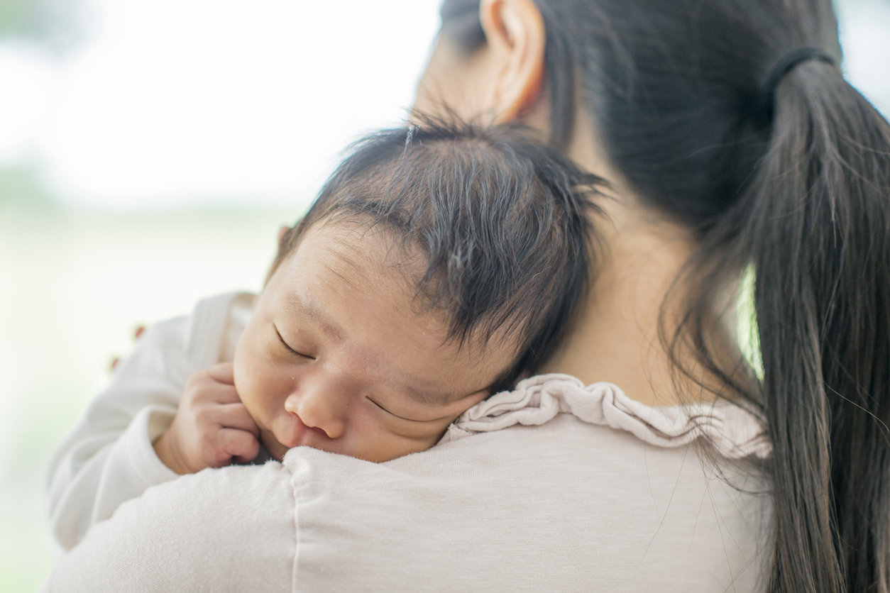 New mom holding baby