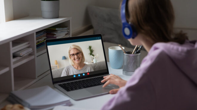 girl talking to her grandma over zoom