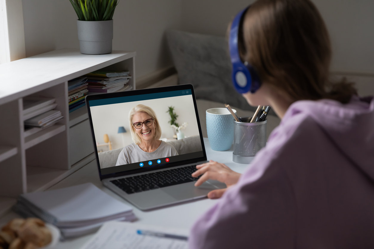 girl talking to her grandma over zoom