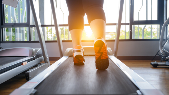 woman running on treadmill