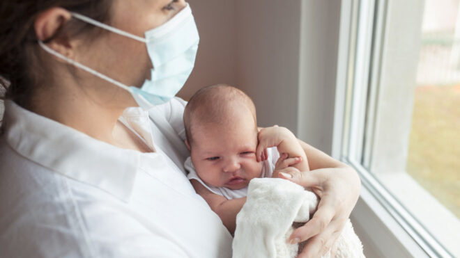 New mom holding baby