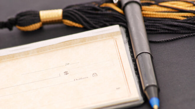 checkbook and tassle