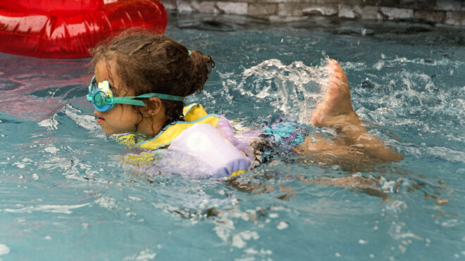 Little girl swimming