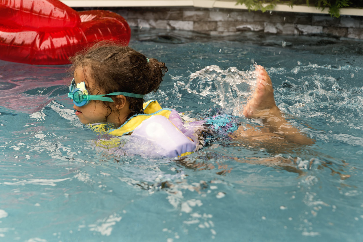 Little girl swimming