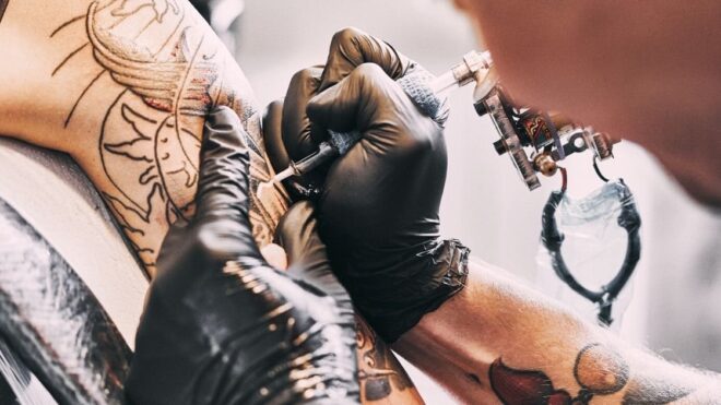person getting tattooed