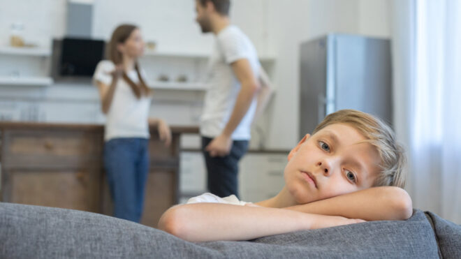 little boy fighting parents