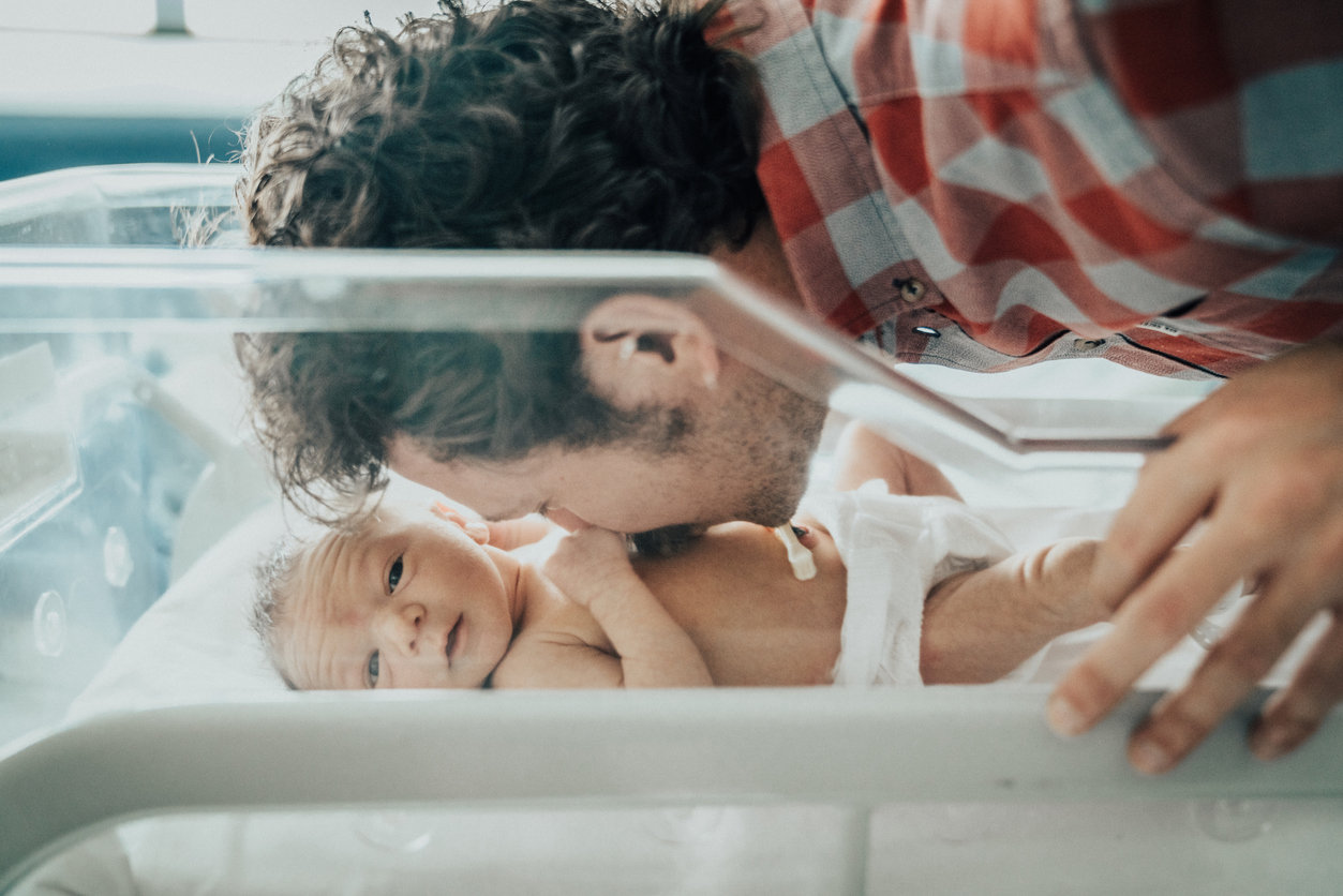 New dad and newborn at hospital