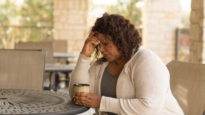 sad woman over coffee