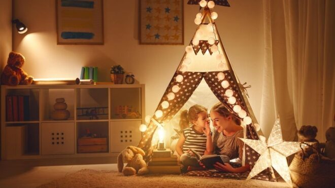 mom and child in play tent in bedroom