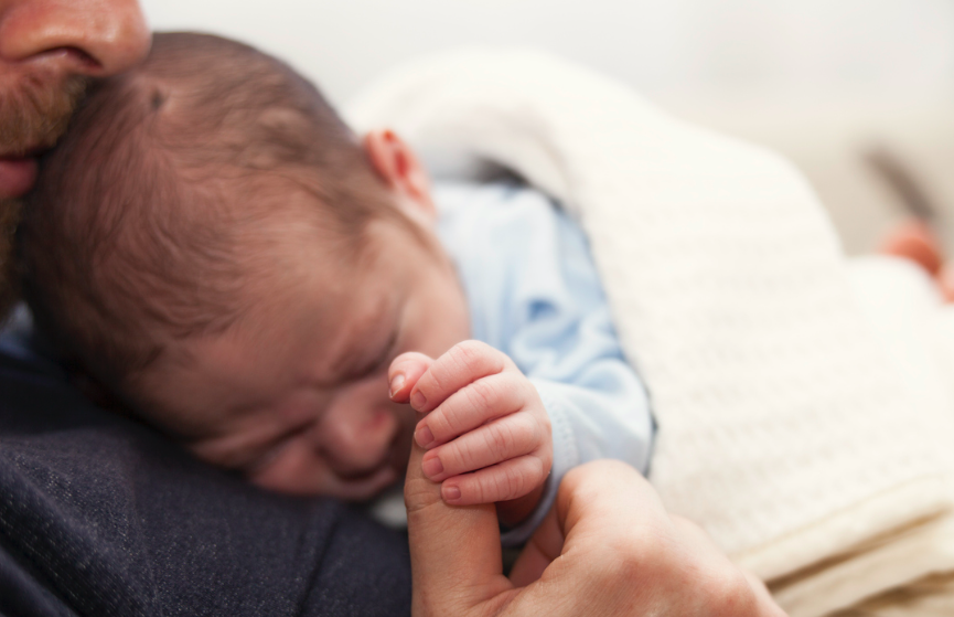 Dad holding baby boy
